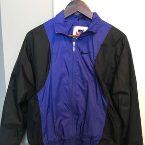 Women’s Nike track jacket/wind breaker.
